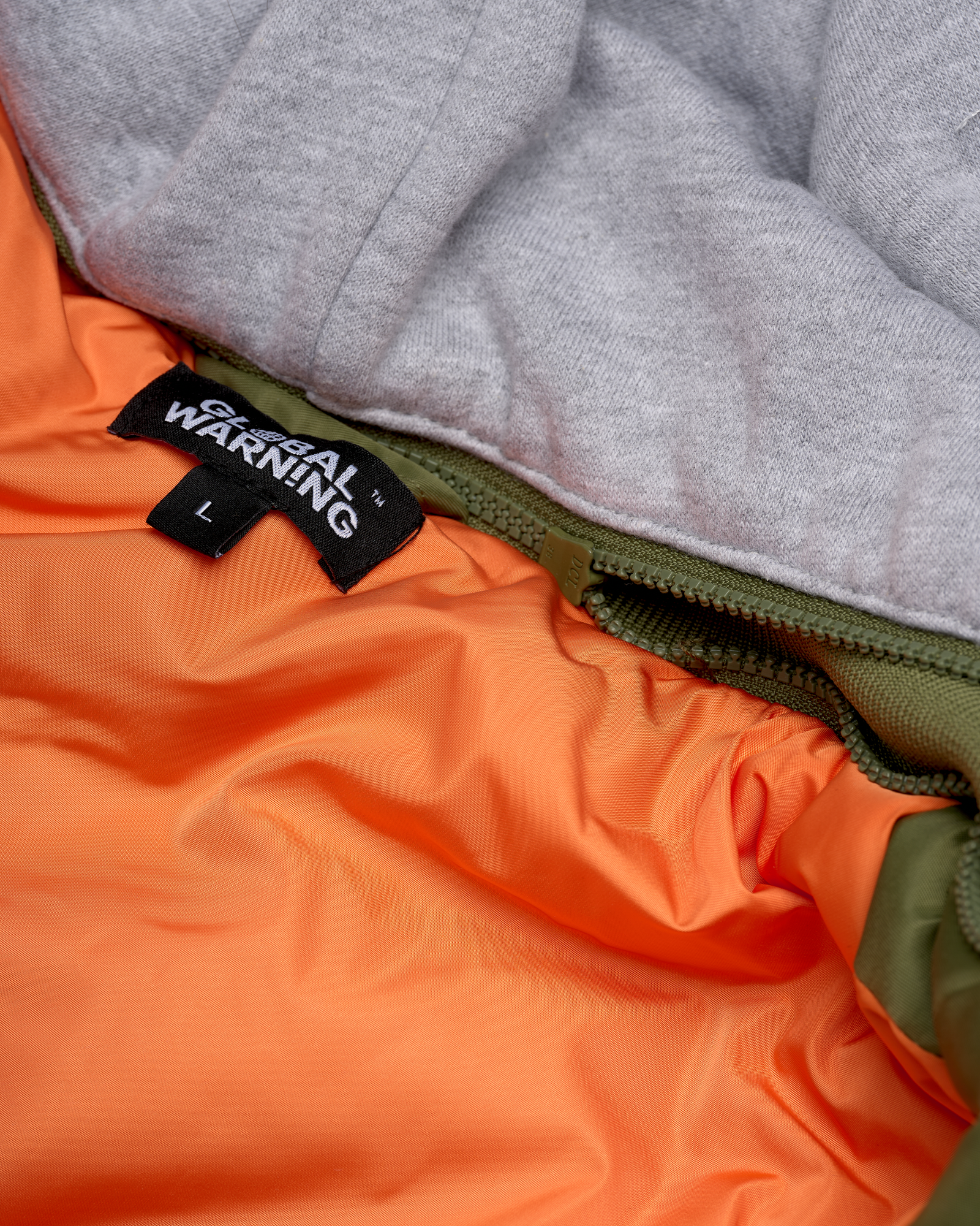 DESOCIALIZED: HOODED GREEN BOMBER JACKET WITH PATCHES