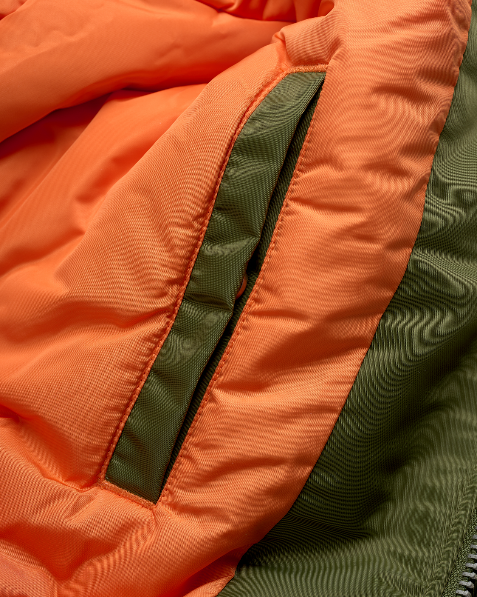 DESOCIALIZED: HOODED GREEN BOMBER JACKET WITH PATCHES